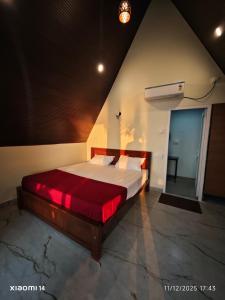 Postel nebo postele na pokoji v ubytování Colomb Beach Huts + 28 fotografií