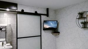 TV a/nebo společenská místnost v ubytování Jujuouragan 2