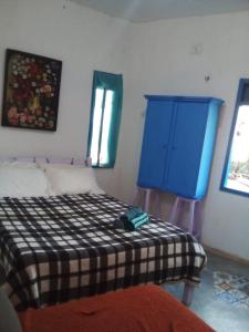 Ένα ή περισσότερα κρεβάτια σε δωμάτιο στο Casa Compartilhada - Shared house