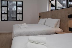 Ένα ή περισσότερα κρεβάτια σε δωμάτιο στο Elsewhere