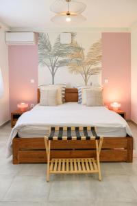 Ένα ή περισσότερα κρεβάτια σε δωμάτιο στο la perle de Delna