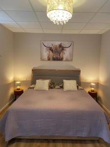 Postel nebo postele na pokoji v ubytování Lagerhaus Gabriel-Oasen in der Stadt