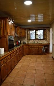 Køkken eller tekøkken på Location saisonnière Villa