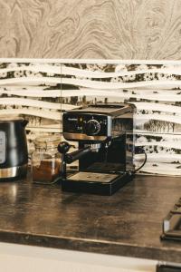 Η κουζίνα ή μικρή κουζίνα στο Cosmic Apart