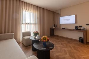 Μια τηλεόραση ή/και κέντρο ψυχαγωγίας στο Citadines Almaz Aparthotel Casablanca