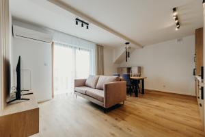 Posezení v ubytování Apartamenty Zaczernie + 7 fotografií