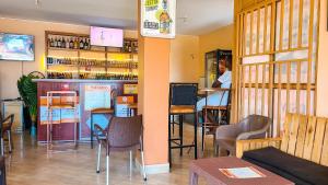 Sjónvarps- og/eða afþreyingartæki á Nik Suites Nangabo