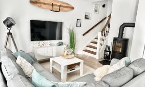 Posezení v ubytování Kleine Freiheit, Büsum - modernes Ferienhaus in Meernähe mit Terrasse, Garten und eigenem Parkplatz + 20 fotografií