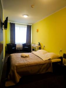 Ένα ή περισσότερα κρεβάτια σε δωμάτιο στο PLATINIUM House ex Royal House