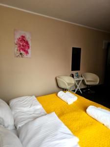 Ένα ή περισσότερα κρεβάτια σε δωμάτιο στο PLATINIUM House ex Royal House