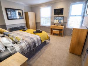 En eller flere senge i et værelse på Alford Road