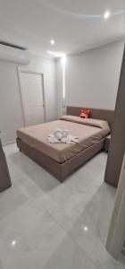a bedroom with a large bed in a room at B&B Grifondoro in Crotone