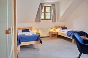 Postel nebo postele na pokoji v ubytování Benedikt Most + 56 fotografií