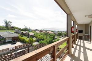 En balkon eller terrasse på Residencial Lares do Rosa + 20 billeder