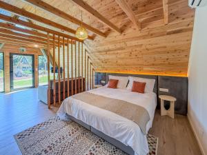 Ένα ή περισσότερα κρεβάτια σε δωμάτιο στο Quinta do Ícaro - Nature Living +18 φωτογραφίες