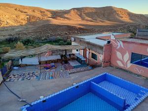 an overhead view of a building with a swimming pool at chez Nael in Ouarzazate