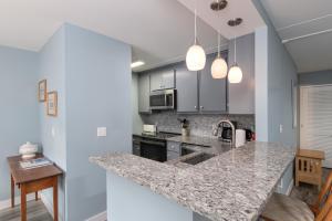 Kuchyň nebo kuchyňský kout v ubytování Bridges 76 condo