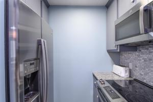 Kuchyň nebo kuchyňský kout v ubytování Bridges 76 condo + 20 fotografií