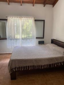 Postel nebo postele na pokoji v ubytování Santa Tere