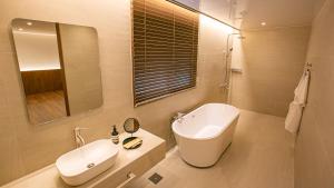 Koupelna v ubytování Hotel Yimok