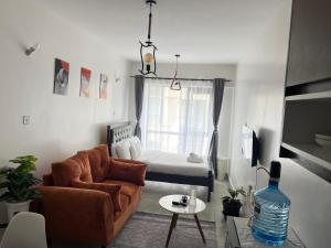 Posezení v ubytování Covesuitesbnb