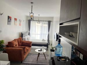 Posezení v ubytování Covesuitesbnb