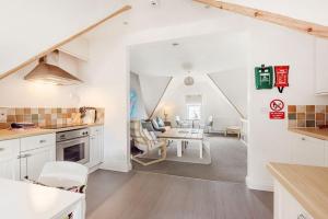 Η κουζίνα ή μικρή κουζίνα στο The Loft