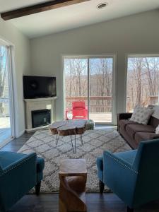 TV/trung tâm giải trí tại Camp Carter Bunkhouse