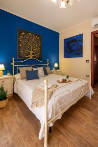 Ένα ή περισσότερα κρεβάτια σε δωμάτιο στο Dimora del Piccolo Principe