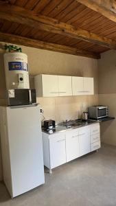 Køkken eller tekøkken på El Atardecer Departamentos