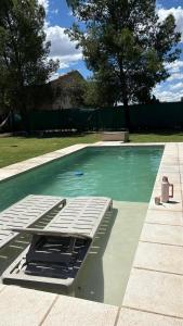 Swimmingpoolen hos eller tæt på El Atardecer Departamentos