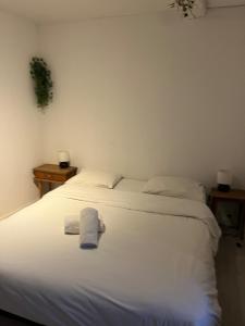 En eller flere senge i et værelse på Le Bohème, Centre ville