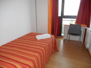 Postel nebo postele na pokoji v ubytování Apartamentos Bahía de Boó