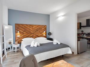 Кровать или кровати в номере Evo Boutique Hotel & SPA +173 фотографии