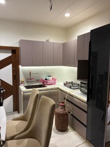 Kuchyň nebo kuchyňský kout v ubytování The Agra Lux- Elite Villa