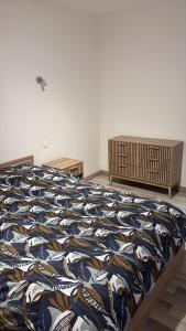 Ένα ή περισσότερα κρεβάτια σε δωμάτιο στο Maison avec 3 chambres et cheminée