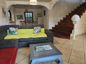 Et opholdsområde på Location saisonnière Villa