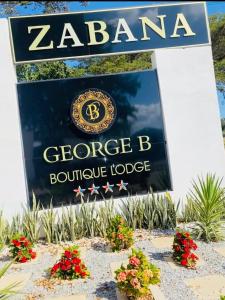 a sign for the entrance to agorge b boutique lodge at GEORGE B BOUTIQUE LODGE in Tzaneen