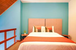 Una cama o camas en una habitación de Hotel Ilar 74