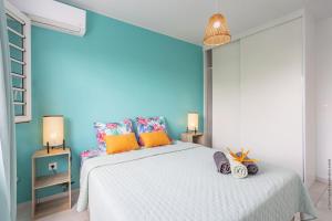 Ένα ή περισσότερα κρεβάτια σε δωμάτιο στο Résidence les 3 Mâts - Le Robert