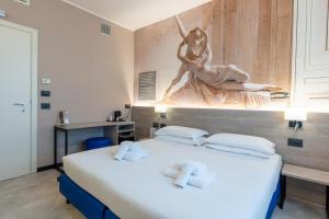 Giường trong phòng chung tại Jet Hotel, Sure Hotel Collection by Best Western