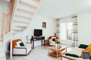 Et tv og/eller underholdning på Biscarrosse centre Duplex avec terrasse 6 personnes