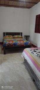 Ένα ή περισσότερα κρεβάτια σε δωμάτιο στο Finca Madre Monte