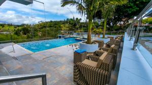 Bazén v ubytování The Palms Hotel nebo v jeho okolí + 10 fotografií