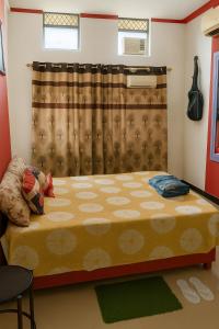 Ένα ή περισσότερα κρεβάτια σε δωμάτιο στο Veena Vihar +6 φωτογραφίες