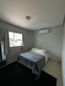 Postel nebo postele na pokoji v ubytování Apartamento completo com veículo opcional