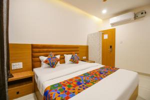 Postel nebo postele na pokoji v ubytování The Gravity Inn