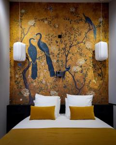 Postel nebo postele na pokoji v ubytování Suite Japonaise Pezenas