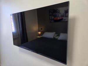 Postel nebo postele na pokoji v ubytování Rho Fiera Flat