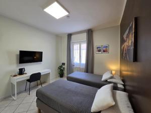 TV a/nebo společenská místnost v ubytování Rho Fiera Flat